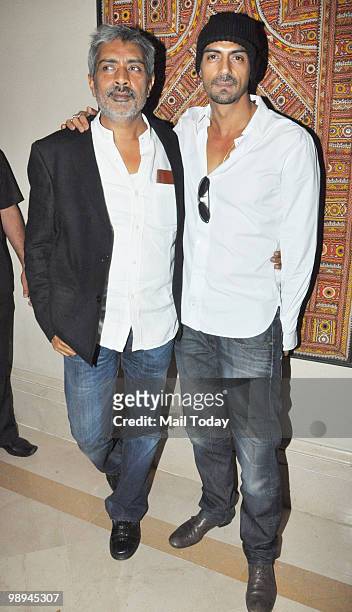 Prakash Jha and Arjun Rampal at a promotional event for the film Rajneeti in Mumbai on May 8, 2010.