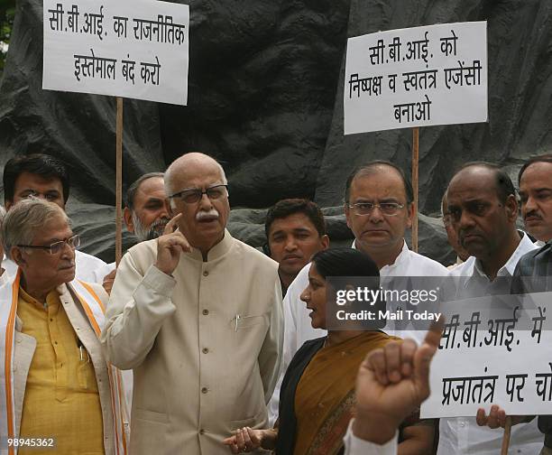 Parliamentary Party Chairman L K Advani along with party MPs Sushma Swaraj, Arun Jaitley along with others staging a protest against the alleged...