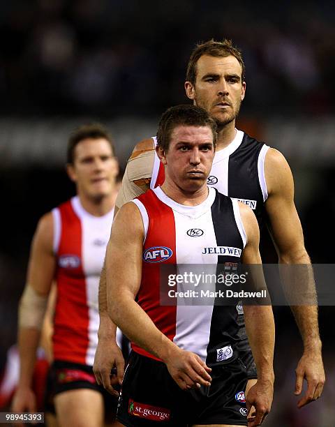 Steven Baker and Steven King of the Saints look dejected after their team lost the round seven AFL match between the St Kilda Saints and the Carlton...