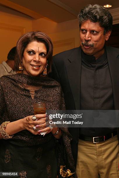 Khushii chairman Kapil Dev with wife Romi at Khushii's Art on Wheels auction titled Main Bade Hoke Truck Banunga in New Delhi on May 7, 2010.