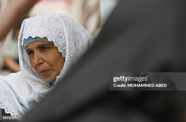 Palestinian women attend a rally near the Erez crossing between Israel and the northern Gaza Strip on May 10 calling for the release of Palestinian...