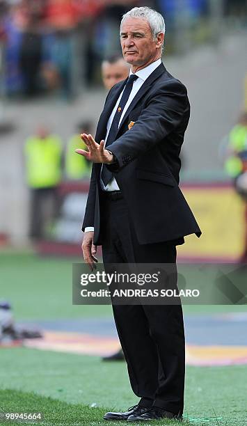 Roma's coach Claudio Ranieri gives orders to his playersduring their Italian Serie A football match against Cagliari on May 9, 2010 at Rome's Olympic...