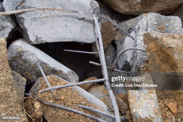 pieces of metal and concrete by demolished - collapsing bridge stock pictures, royalty-free photos & images