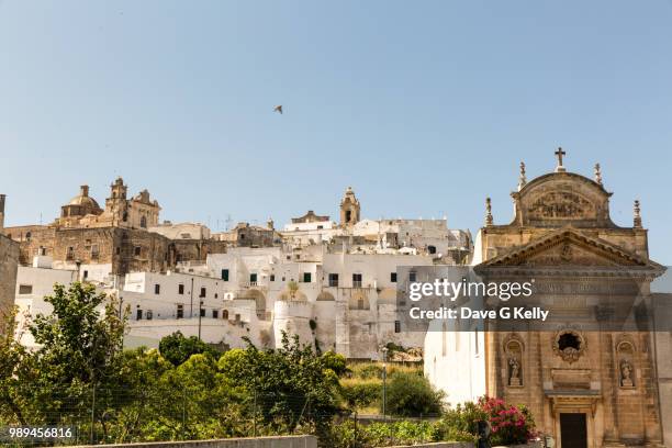 medieval whitewashed hilltop puglian town - brindisi stock pictures, royalty-free photos & images