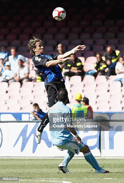 Fabio Quagliarella of SSC Napoli battles for the ball with Thomas Manfredini of Atalanta BC during the Serie A match between SSC Napoli and Atalanta...