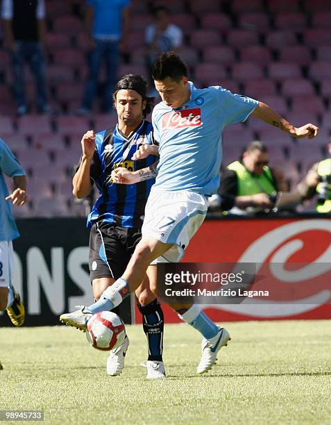 Marek Hamsik of SSC Napoli battles for the ball with FAbio Ceravolo of Atalanta BC during the Serie A match between SSC Napoli and Atalanta BC at...