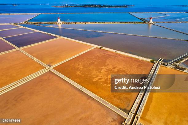 marsala salt ponds natural reserve, sicily, italy - salina foto e immagini stock