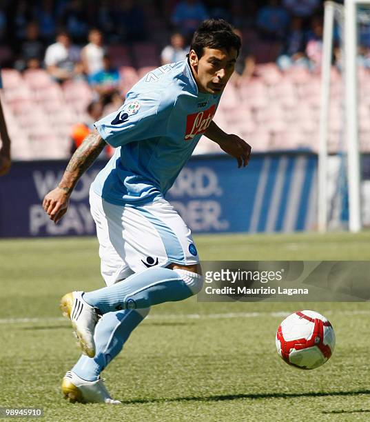 Ezequiel Lavezzi of SSC Napoli runs with the ball during the Serie A match between SSC Napoli and Atalanta BC at Stadio San Paolo on May 9, 2010 in...