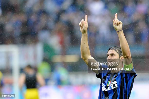 Inter Milan's Argentinian defender and captain Javier Aldemar Zanetti gestures at the end of his team's Serie A football match against Chievo at San...