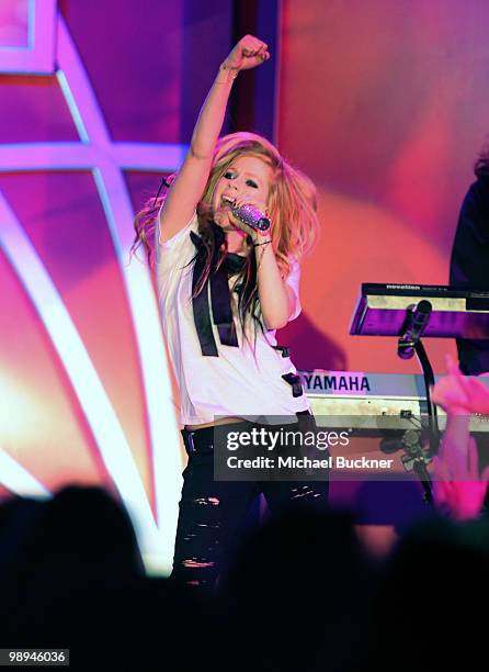 Musician Avril Lavigne performs onstage during the 17th Annual Race to Erase MS event co-chaired by Nancy Davis and Tommy Hilfiger at the Hyatt...