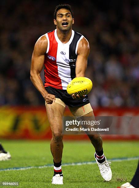 Raphael Clarke of the Saints handballs during the round seven AFL match between the St Kilda Saints and the Carlton Blues at Etihad Stadium on May...