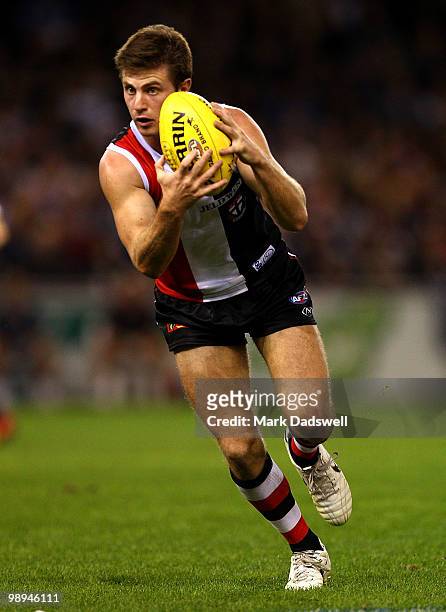 Andrew McQualter of the Saints gathers the ball during the round seven AFL match between the St Kilda Saints and the Carlton Blues at Etihad Stadium...