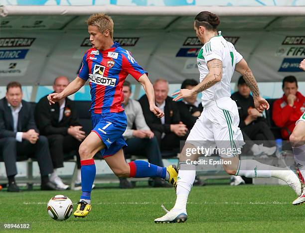 Keisuke Honda of PFC CSKA Moscow battles for the ball with Blagoy Georgiev of FC Terek Grozny during the Russian Football League Championship match...