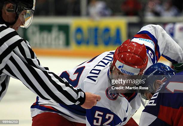 Viktor Kozlov of Russia focus the puck during the IIHF World Championship group A match between Slovakia and Russia at Lanxess Arena on May 9, 2010...