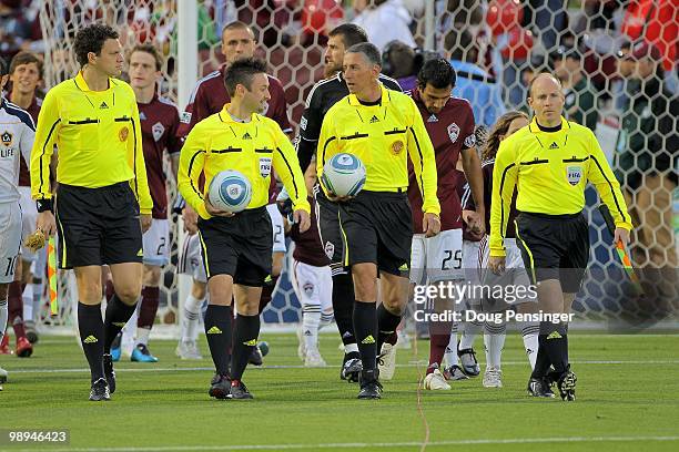 Assistant Referee Peter Manikowski, Referee Edvin Jurisevic, Fourth Official Ben Chouaf and Assistant Referee Anthony Vasoli lead the Los Angeles...