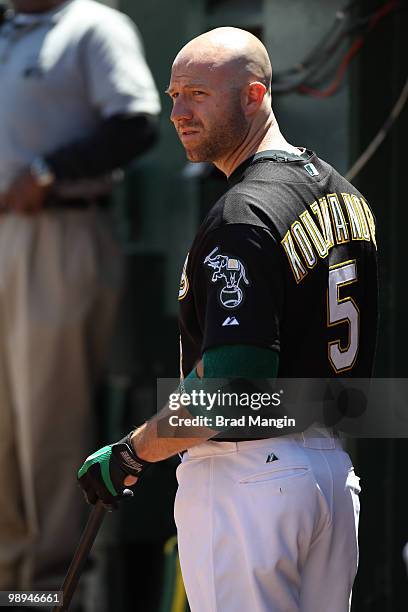 Kevin Kouzmanoff of the Oakland Athletics watches from the dugout during the game between the Texas Rangers and the Oakland Athletics on Wednesday,...