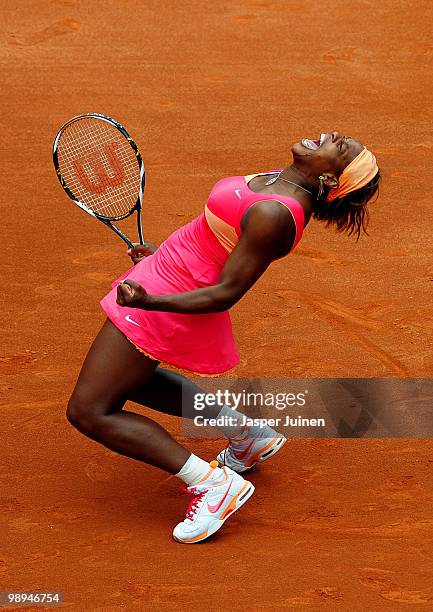 Serena Williams of the USA celebrates her win over Vera Dushevina of Russia in their second round match during the Mutua Madrilena Madrid Open tennis...