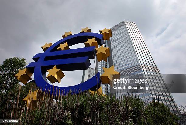 The euro sign sculpture is seen outside the European Central Bank headquarters in Frankfurt, Germany, on Monday, May 10, 2010. The euro strengthened...