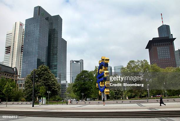 The euro sign sculpture sits near the European Central Bank headquarters in Frankfurt, Germany, on Monday, May 10, 2010. The euro strengthened the...