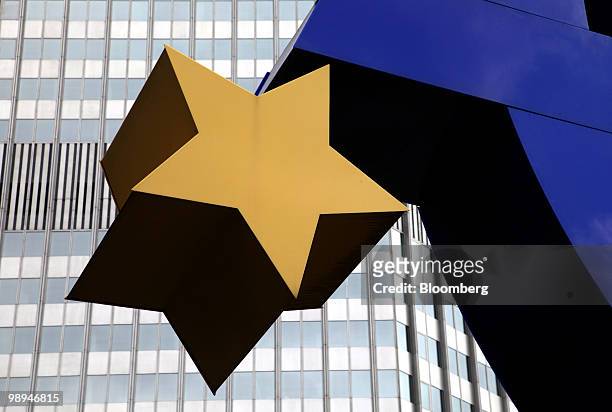 The euro sign sculpture is seen outside the European Central Bank headquarters in Frankfurt, Germany, on Monday, May 10, 2010. The euro strengthened...