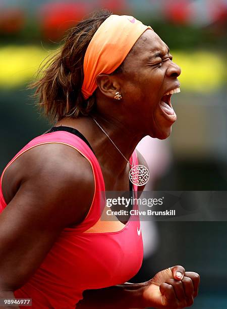 Serena Williams of the USA celebrates a point against Vera Dushevina of Russia in their second round match during the Mutua Madrilena Madrid Open...