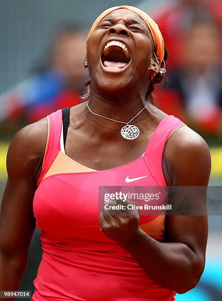 Serena Williams of the USA celebrates a point against Vera Dushevina of Russia in their second round match during the Mutua Madrilena Madrid Open...