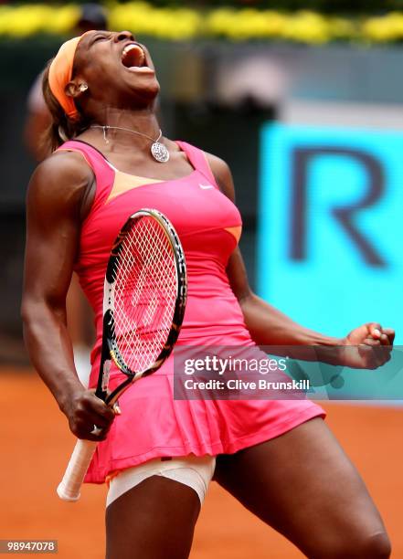 Serena Williams of the USA celebrates a point against Vera Dushevina of Russia in their second round match during the Mutua Madrilena Madrid Open...