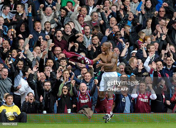 West Ham United's Portuguese player Luis Boa Morte celebrates after he scores the opening goal of the English Premier League football match between...