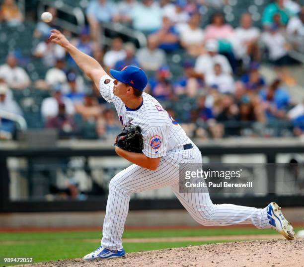 Pitcher Chris Flexen of the New York Mets pitches in relief in the 11th inning in an MLB baseball game against the Los Angeles Dodgers on June 24,...