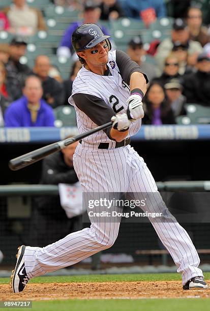 Troy Tulowitzki of the Colorado Rockies takes an at bat against the Florida Marlins at Coors Field on April 25, 2010 in Denver, Colorado. The Rockies...