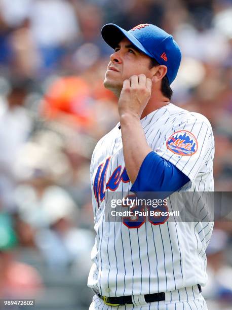 Pitcher Anthony Swarzak of the New York Mets reacts in the 7th inning in an MLB baseball game against the Los Angeles Dodgers on June 24, 2018 at...