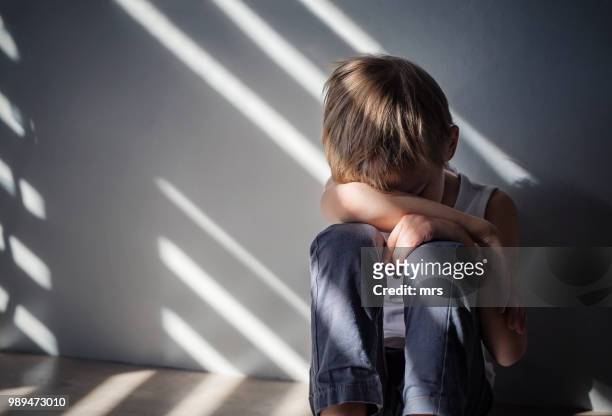sad boy - childhood stock pictures, royalty-free photos & images