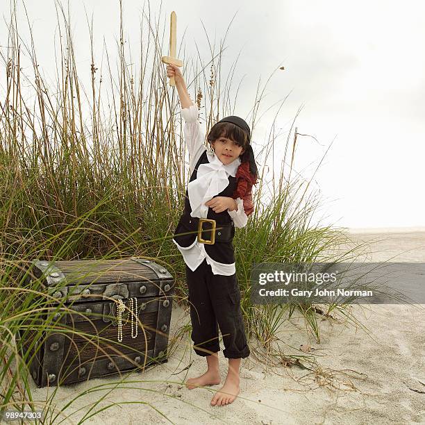 child dressed as pirate with sword - newfamily stock pictures, royalty-free photos & images