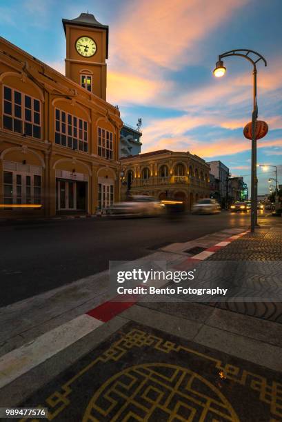 phuket, thailand -june 30, 2018 : old building sino-portuguese style landmark of phuket in night time - inside clock tower stock pictures, royalty-free photos & images