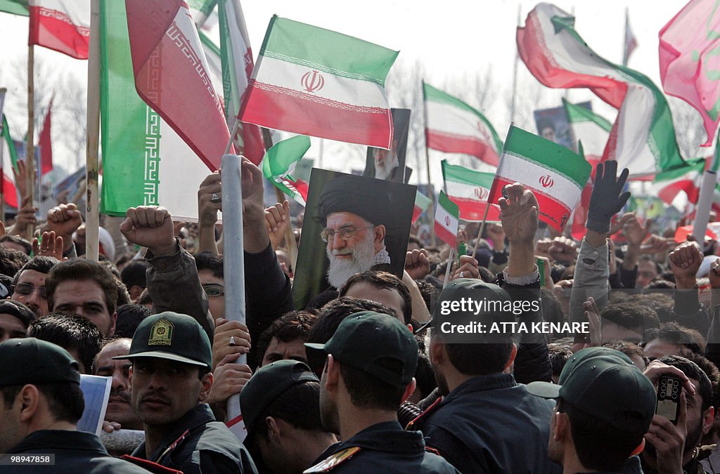 Iranian security froces stand guard (for