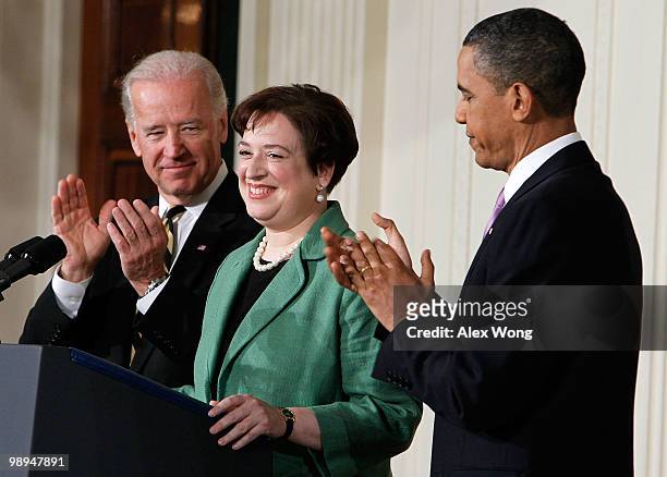 President Barack Obama applauds with Vice President Joe Biden while introducing Solicitor General Elena Kagan as his choice to be the nation's 112th...