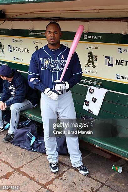 Carl Crawford of the Tampa Bay Rays gets ready in the dugout before the game between the Tampa Bay Rays and the Oakland Athletics on Sunday, May 9 at...