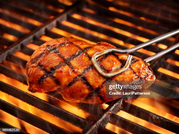 bbq chicken breast - tongs work tool stock pictures, royalty-free photos & images