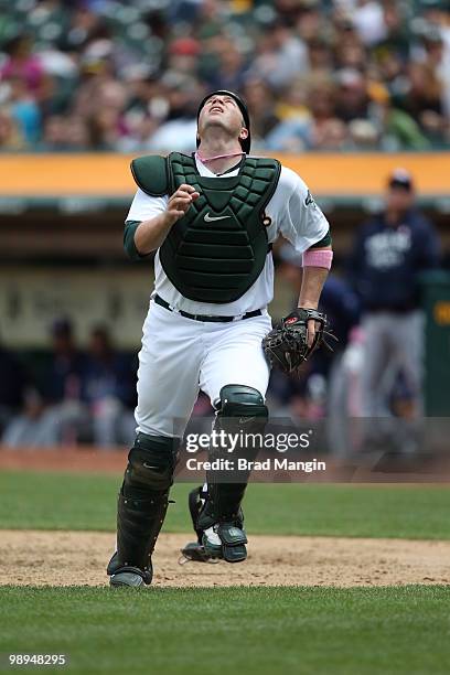 Landon Powell of the Oakland Athletics chases a foul ball during the game between the Tampa Bay Rays and the Oakland Athletics on Sunday, May 9 at...