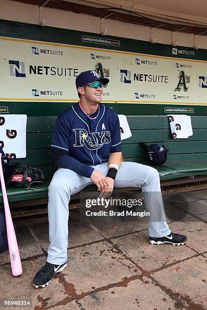 Evan Longoria of the Tampa Bay Rays gets ready in the dugout before the game between the Tampa Bay Rays and the Oakland Athletics on Sunday, May 9 at...