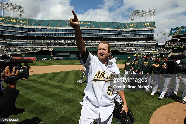 Dallas Braden of the Oakland Athletics celebrates his perfect game after the game between the Tampa Bay Rays and the Oakland Athletics on Sunday, May...