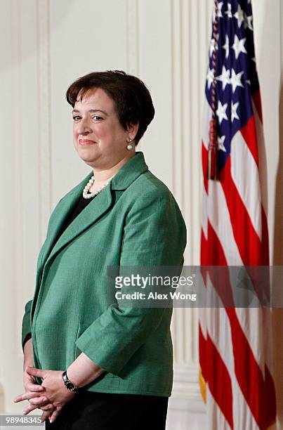 Solicitor General Elena Kagan listens as she is introduced as U.S. President Barack Obama's choice to be the nation's 112th Supreme Court justice...
