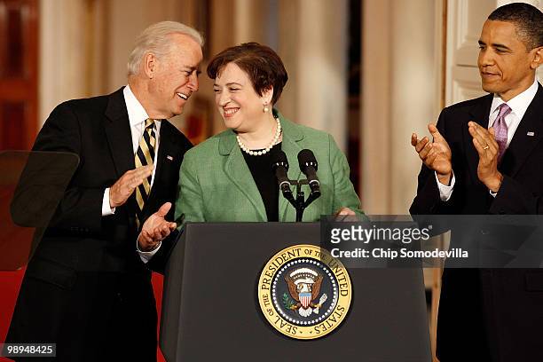 Vice President Joe Biden leans in to whisper to Solicitor General Elena Kagan after President Barack Obama announced her as his choice to be the...
