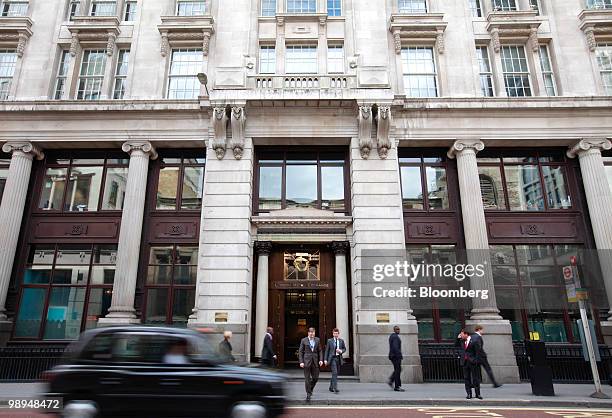 Pedestrians pass the London Metal Exchange in London, U.K., on Monday, May 10, 2010. The euro rallied and stocks climbed around the world, sending...