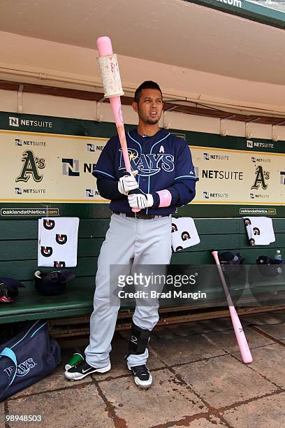 Jason Bartlett of the Tampa Bay Rays gets ready in the dugout before the game between the Tampa Bay Rays and the Oakland Athletics on Sunday, May 9...