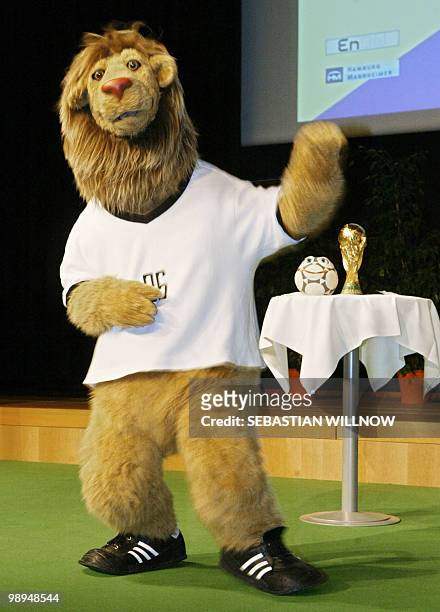 The official mascot for the 2006 World Cup in Germany, a lion called "Goleo VI", dances during its official presentation by Brazilian World Cup...