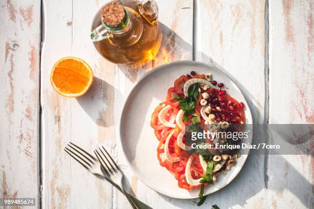 heirloom raf tomato salad with walnut oil 1 - italian parsley stock pictures, royalty-free photos & images