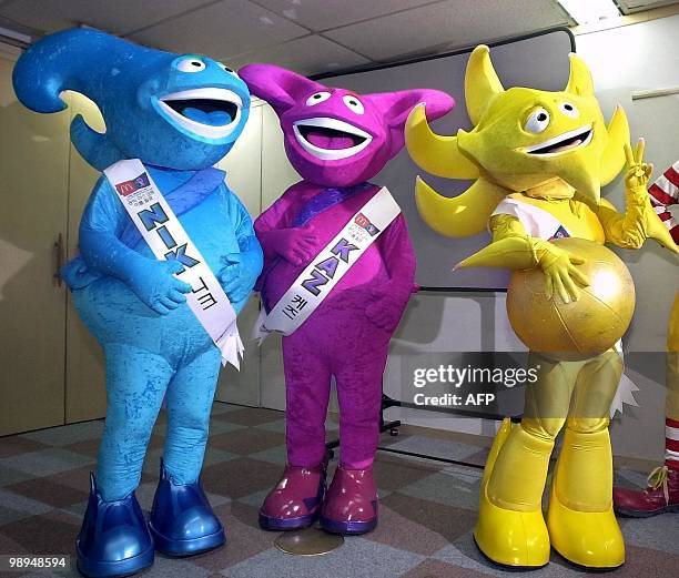 Three mascots of the 2002 World Cup Korea-Japan pose for photographers in Seoul 26 April 2001. Korean organizing committee for the 2002 World Cup...