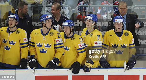 Players of Sweden Jimmie Ericsson, Johan Harju, Linus Omark, Jonas Andersson and coach Bengt-Ake Gustafsson are pictured during the IIHF Ice Hockey...