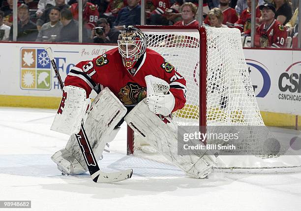 Goalie Antti Niemi of the Chicago Blackhawks protects the net at Game Two of the Western Conference Semifinals against the Vancouver Canucks during...